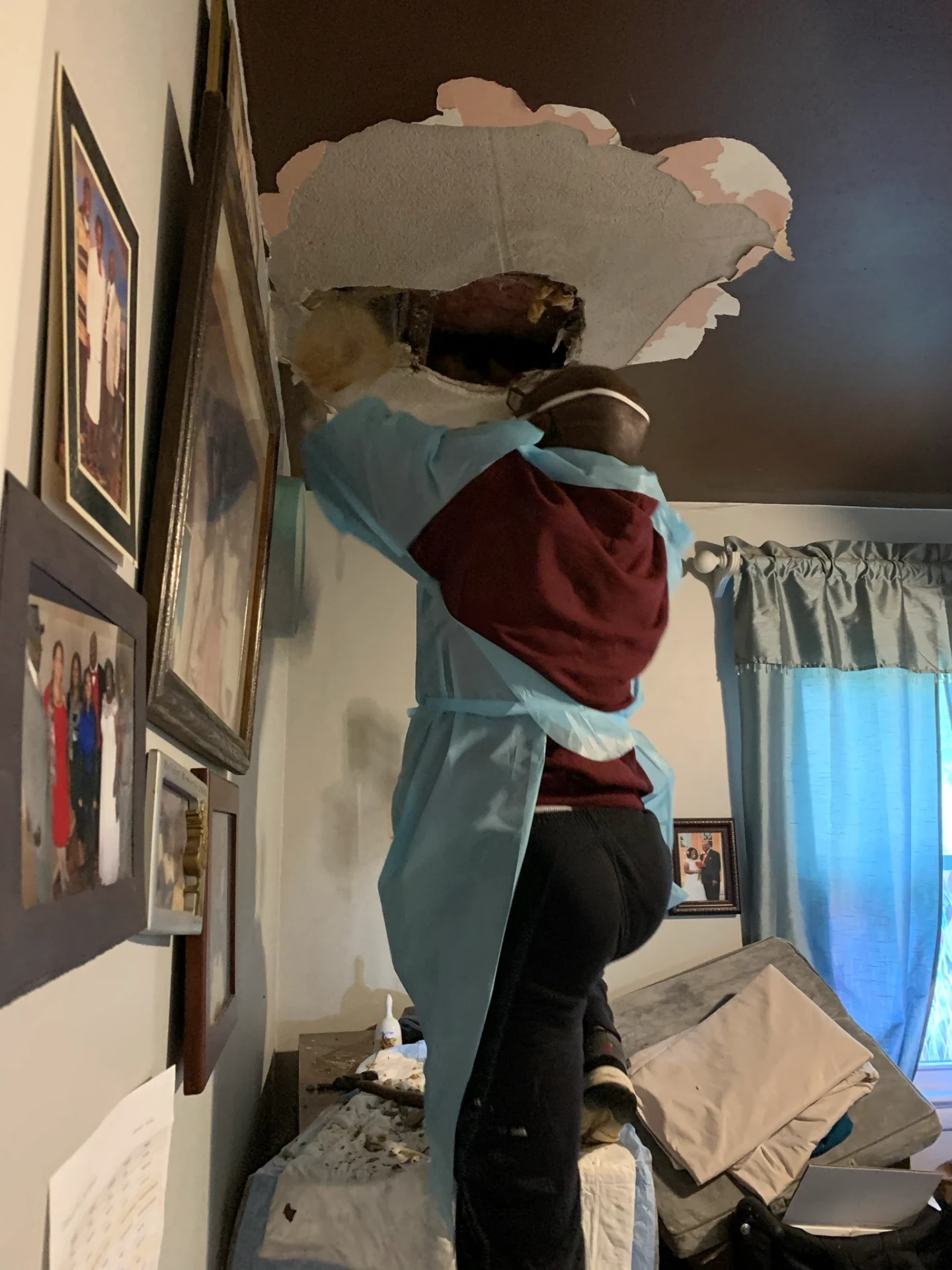 Ken Beaty performing ceiling repair